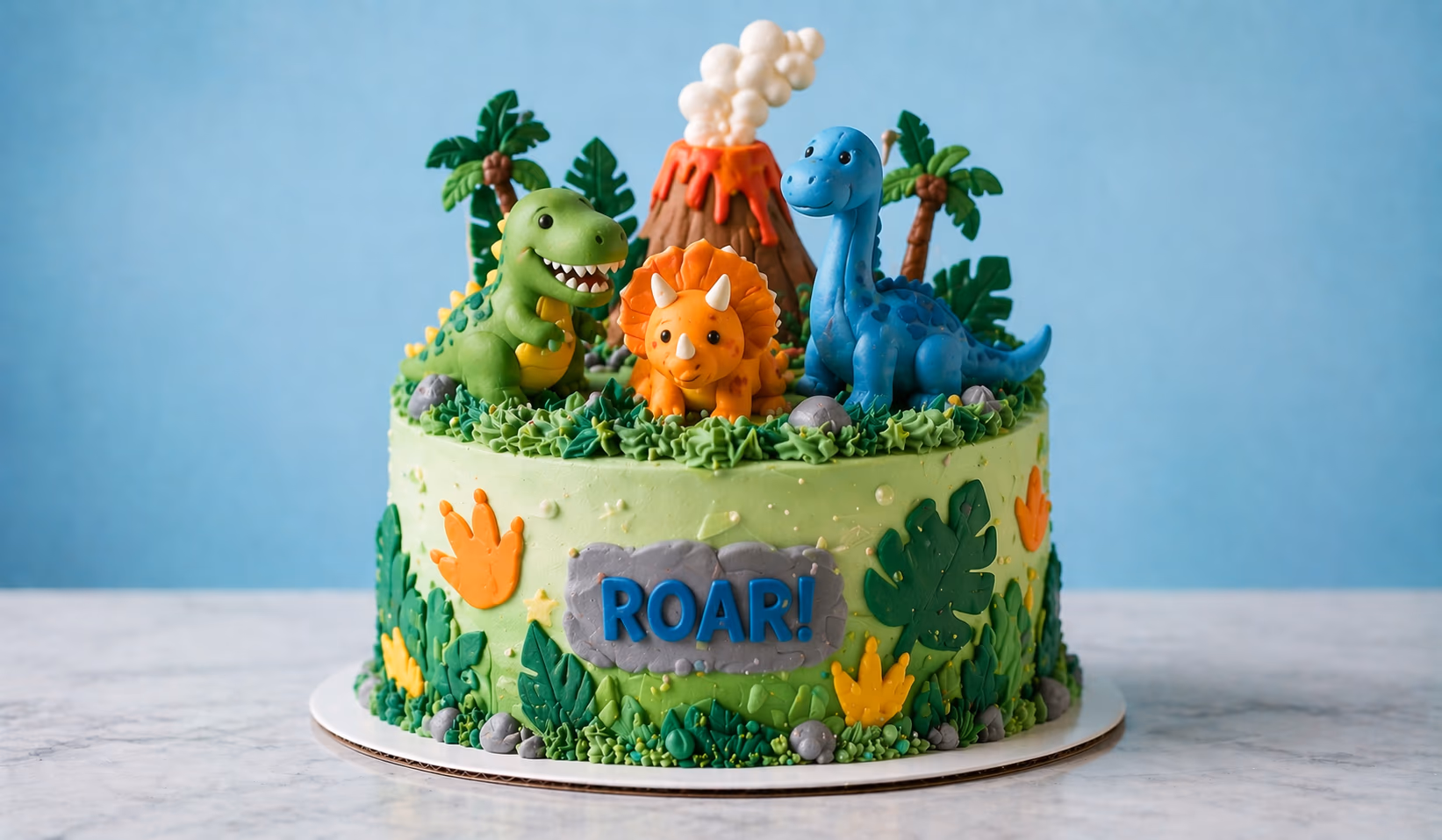 Dinosaur birthday cake with themed decorations